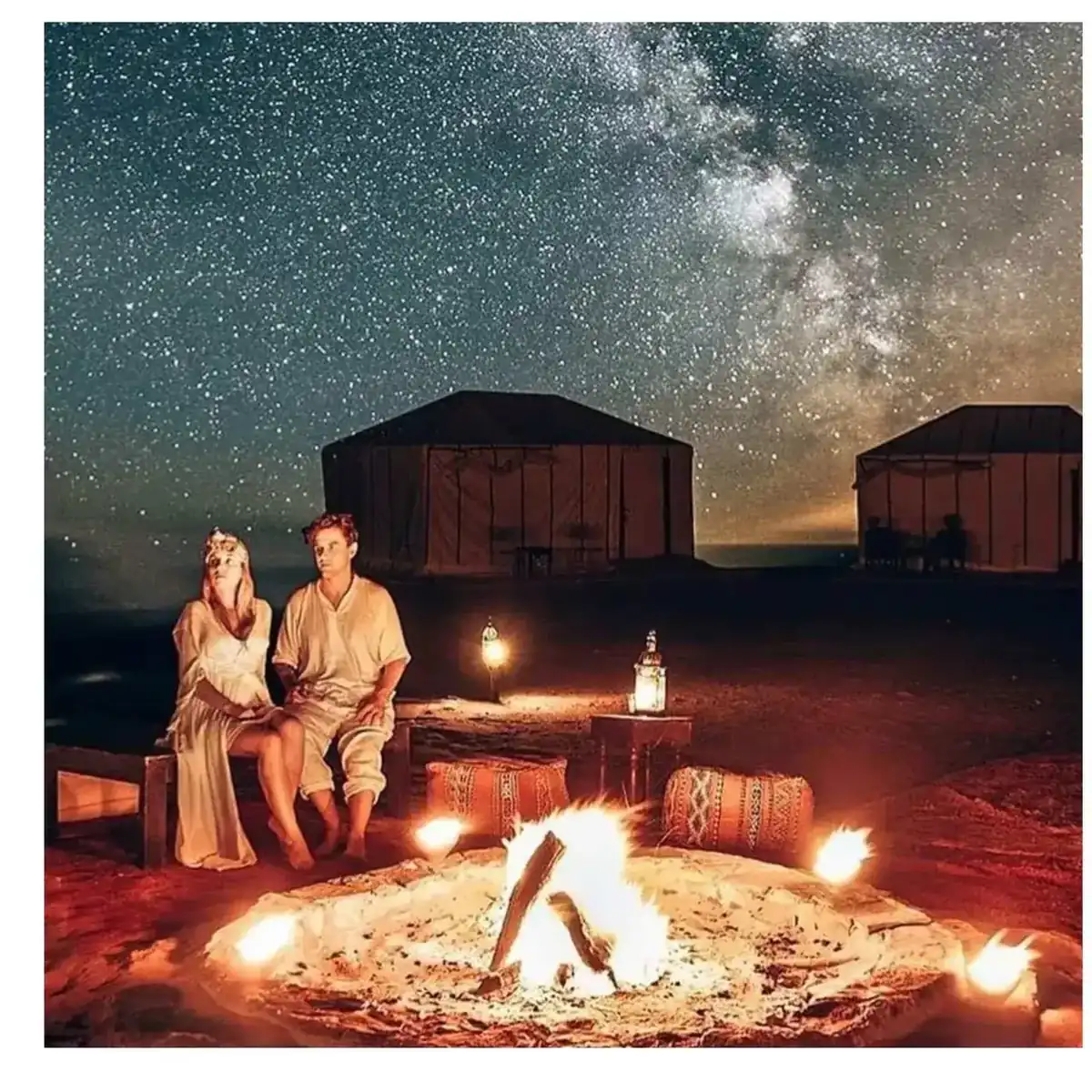 Guests around the campfire at Merzouga Glamping