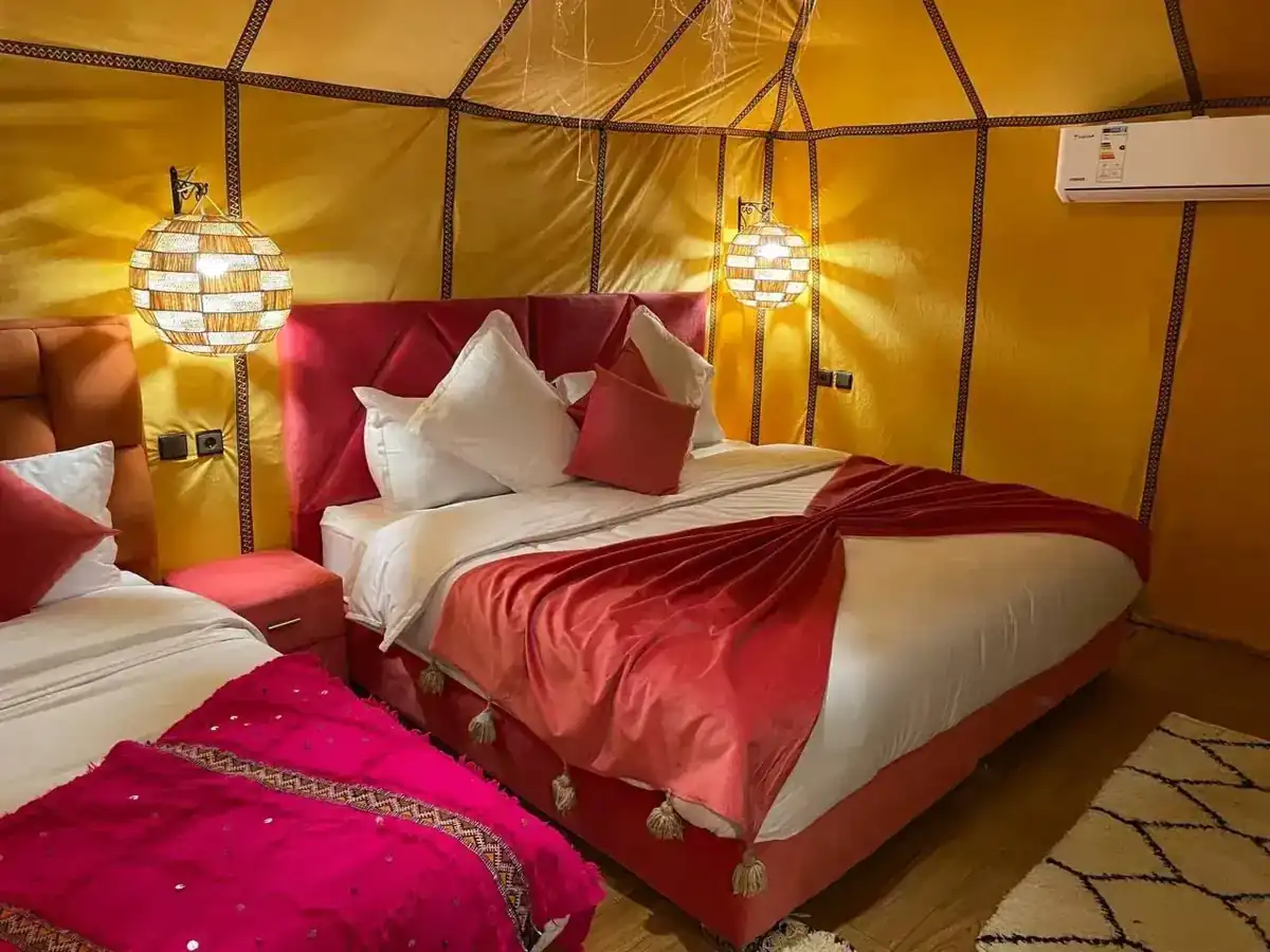 Double luxury tent interior at Merzouga Glamping